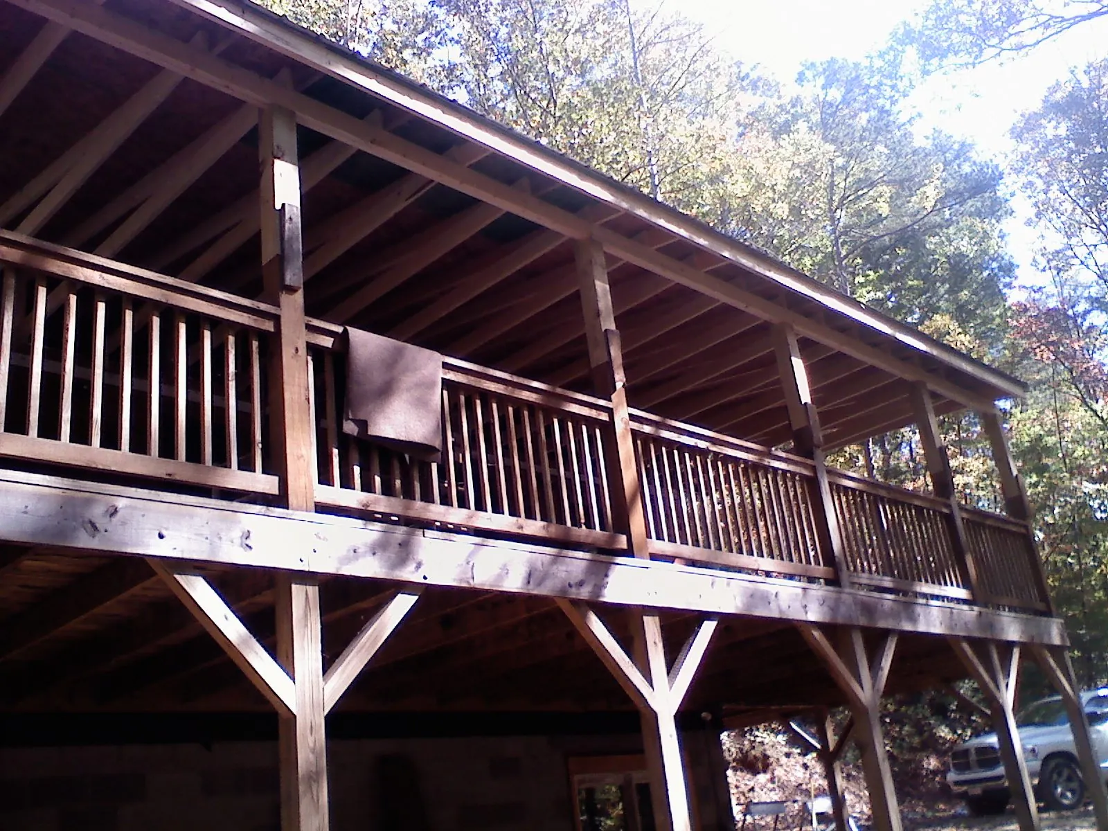 Timber framing under a new elevated porch and deck — Roof Leak Repair in Palatine by Roofing Brothers